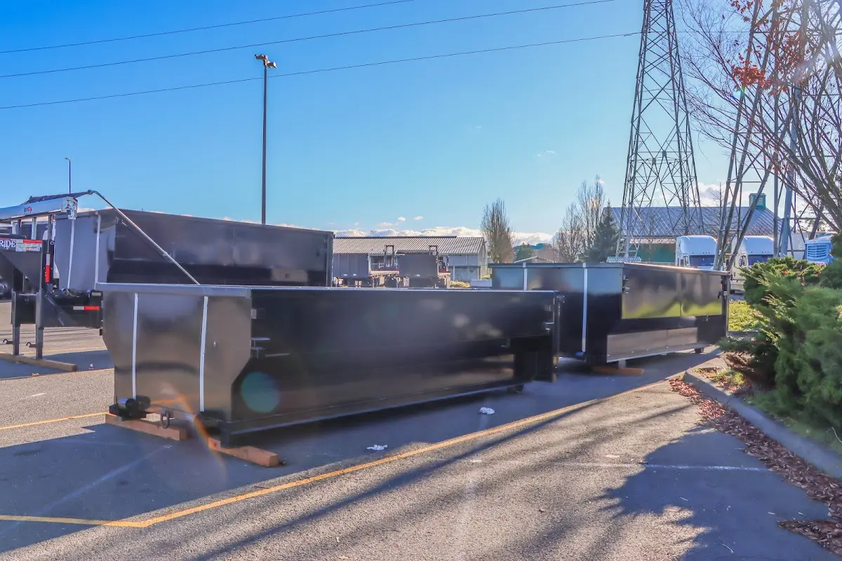 Roll-off dumpster ready for waste disposal at job site for Construction Dumpster Rental in Westchase